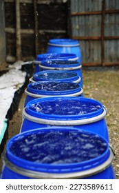 the blue drum is used to collect rainwater