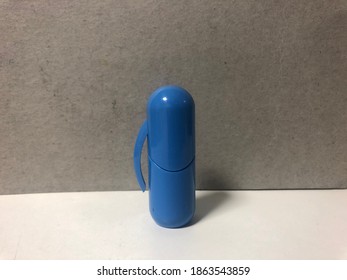 Blue Earplugs On The Desk