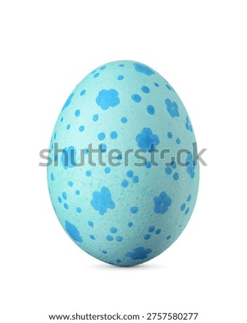 Blue Easter egg with small flowers and dots isolated on a white background.