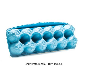 Blue Egg Box Of A Dozen Eggs Isolated On White Background.