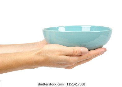 Blue empty ceramic bowl with hand isolated on white background.