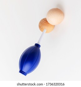 Blue Enema And Two Wood Balls