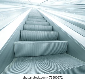 blue escalator in motion - Shutterstock ID 78380572