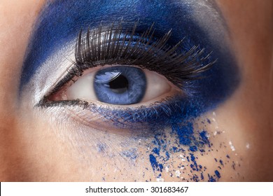 Blue Eye With Fantasy Fashion Make Up. Close Up Studio Shooting. Beauty And High End Fashion Make Up