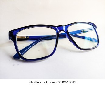 Blue Eye Glasses Or Spectacles With Blue Ray Resistance That Isolated On White Background .