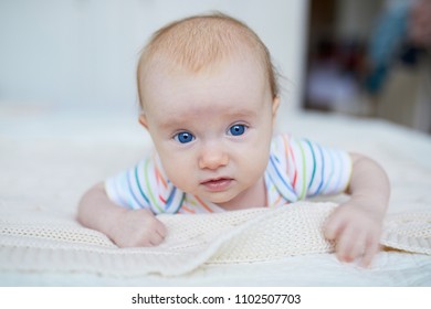 Blue Eyed Baby Girl Doing Tummy Time