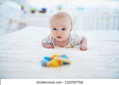 Blue Eyed Baby Girl Doing Tummy Time