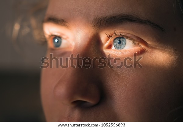 Blue eyed woman\'s\
face