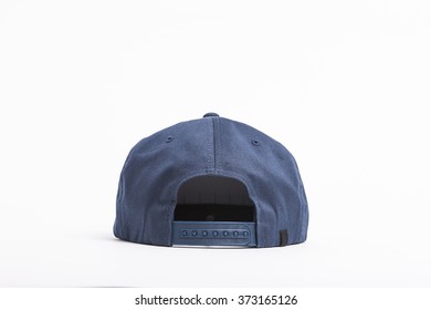 A Blue Fabric Hat(cap) With Solid Back Side View For Hip Hop On The Bottom Isolated White.