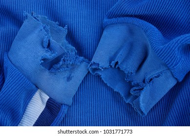 Blue Fabric Texture With Torn Sleeves On Old Clothes