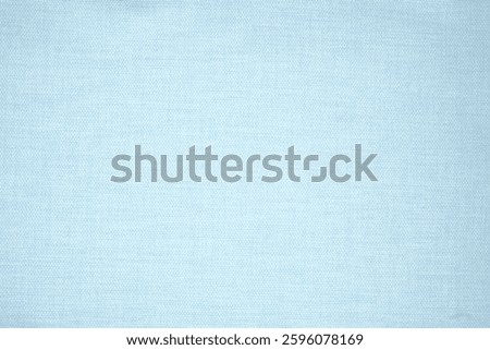 Blue fabric textured empty background. Light blue background. Blue background for designs and text. Light blue background for designs and text.