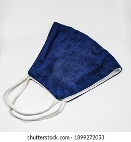 Blue Face Mask On White Background. Prevent Covid 19