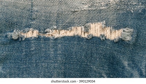 Blue Faded Old Ripped Jeans Closeup, Scrapes