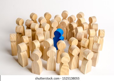 The Blue Figure Of The Leader Is Surrounded By A Crowd Of People. Leadership And Team Management, An Example For Imitation. Loyalty And Trust. Idol. Like-minded People And Followers