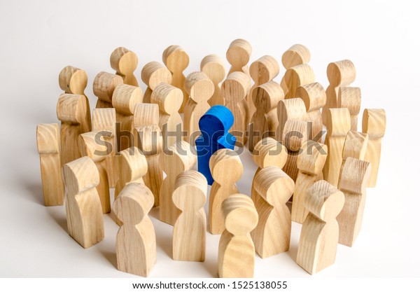 The
blue figure of the leader is surrounded by a crowd of people.
Leadership and team management, an example for imitation. Loyalty
and trust. Idol. Like-minded people and
followers