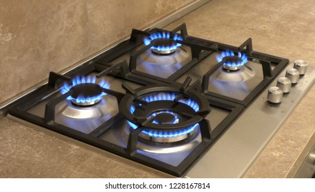 Blue fire of new gas tile - Shutterstock ID 1228167814