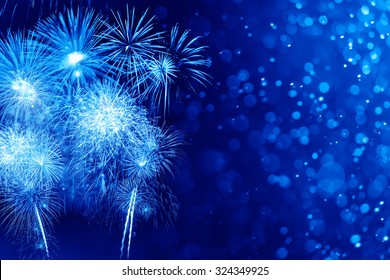 Blue Fireworks With Abstract Bokeh Background
