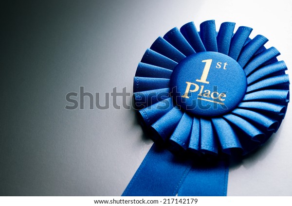 Blue First Place Winner Rosette Badge Stock Photo (Edit Now) 217142179