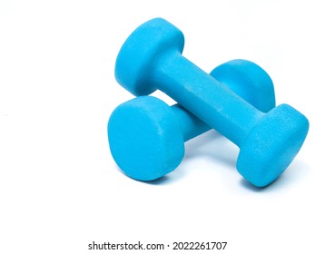 blue fitness dumbbells on a white background. the concept of a healthy lifestyle. fitness attributes - Shutterstock ID 2022261707