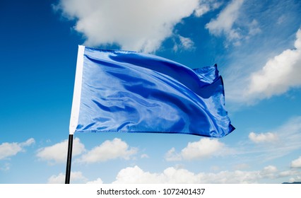 Blue Flag Waving On Sky 