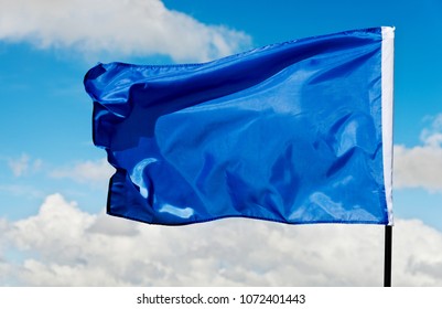 Blue Flag Waving On Sky 