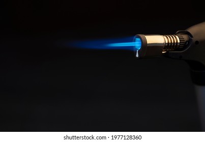 Blue Flame From A Gas Torch Burner On Black Background