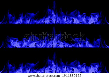Blue flame on black background