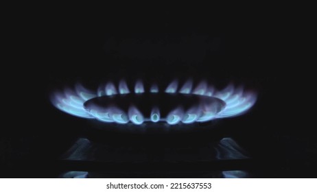 The Blue Flame On The Gas Stove Goes Out. Natural Gas. Kitchen In The House. Cooking Food. Room Heating. Gas Crisis. Energy Resources. Close-up.