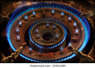 Blue Flames Of Gas Burning From A Kitchen Gas Stove