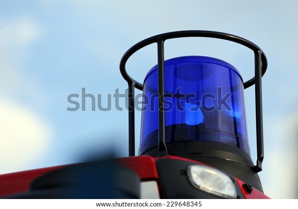 blue flashing light on\
the fire vehicle