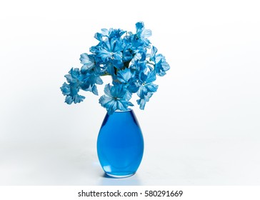 Blue Flowers In A Vase 