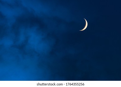 Blue Foggy Sky With Crescent Or Half Moon