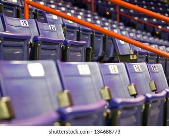 Blue Folding Seats At An Indoor Sports Arena