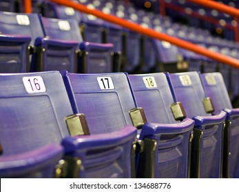 Blue Folding Seats At An Indoor Sports Arena