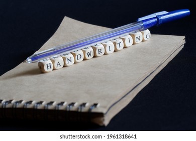 Blue Fountain Pen, Eco-friendly Notebook And Handwriting On A Dark Background. Concept Of Handwriting Science And Automatic Recognition Of Handwritten Text. Close-up