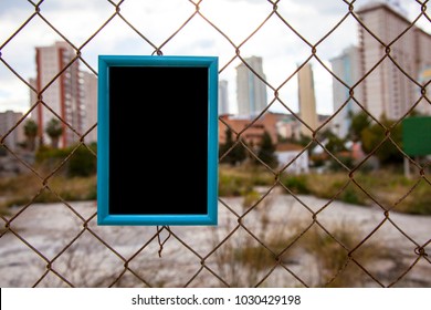 Blue Frame For Photograph. Fence From The Mesh. Mock Up.