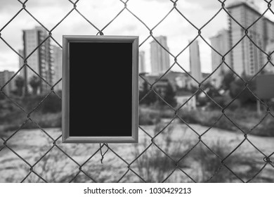 Blue Frame For Photograph. Fence From The Mesh. Mock Up.