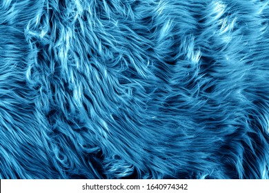 Blue Fur For Background Or Texture. Fuzzy Blue Fur Plaid. Shaggy Blanket Background. Fluffy Fake Textile Fur. Flat Lay, Top View, Copy Space