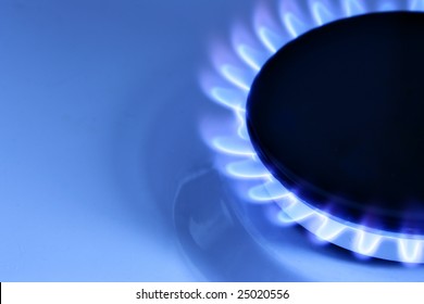 Blue Gas Flame On Hob And Space For Text On Left