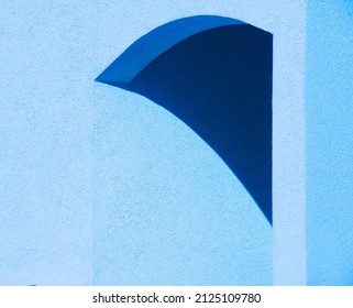 Blue Geometric Shadow Shapes In Concrete Archway Of Exterior Home Shades Of Blue Entrance Arched Triangle With Angles Horizontal Background Backdrop Or Wallpaper Room And Empty Space For Type Or Logo