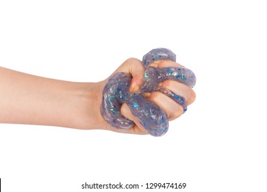 Blue Glitter Slime Squeezed In Hand. Isolated On White