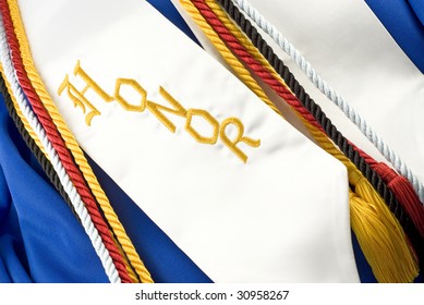 A Blue Graduation Gown With Cords And The Word Honors, Horizontal Full Frame