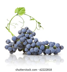 Blue Grape With Green Leaf Isolated On White