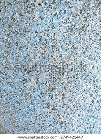 Blue and gray abstract texture background with random speckled pattern. Grunge surface detail for design, wallpaper, and creative projects with copy space.