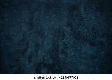    Blue green grunge background. Toned stone wall surface. Close-up. Dark background with space for design.                            