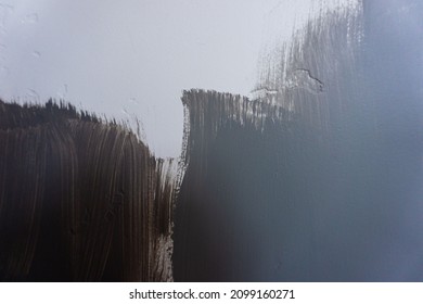 Blue Grey And Green Paint Swatches On A White Textured Wall