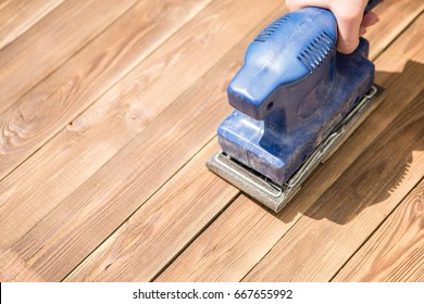 Blue Grinder On Wooden Floor, Photo Above