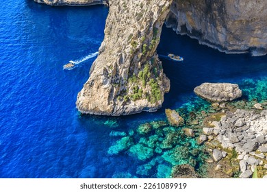 Blue Grotto in Malta.  The sea cave is located near Wied iż-Żurrieq south of Żurrieq in the southwest of the island of Malta.