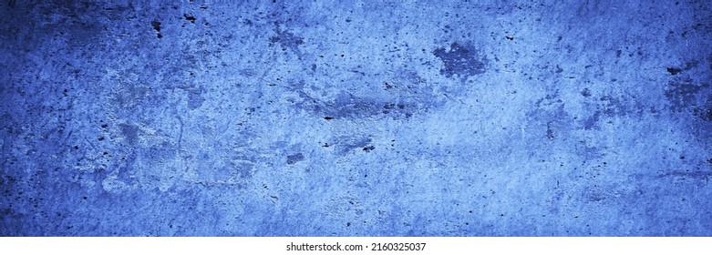 Blue grunge texture. Toned rough wall surface. Background with space for design. Web banner. Wide. Panoramic.                              