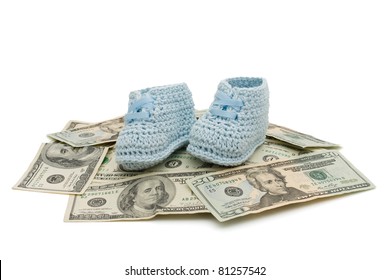 Blue Hand Made Baby Booties On Some American Money Isolated On White, Cost Of Raising A Child